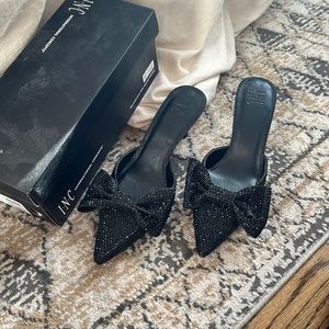 Black kitten heel bow mules from INC